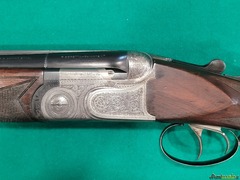Sovrapposto marca P.Beretta modello ASE calibro 12
