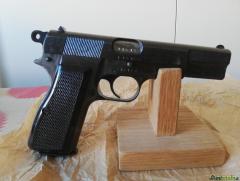 Pistola Browning H35