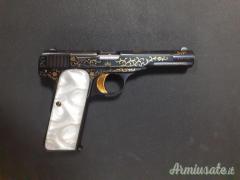 Pistola Browning fn 10/22 cal 7.65 br grado 5 incisioni con riporti in oro condizioni perfette