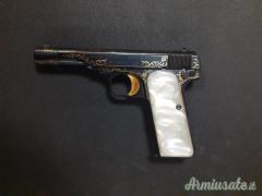 Pistola Browning fn 10/22 cal 7.65 br grado 5 incisioni con riporti in oro condizioni perfette