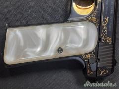 Pistola Browning fn 10/22 cal 7.65 br grado 5 incisioni con riporti in oro condizioni perfette