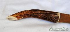 COLTELLO ARTIGIANALE REALIZZATO A MANO CON IMPUGNATURA IN CORNO DI CERVO
