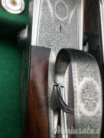 Importante coppia di Fabbrizioli side lock fucili gemelli cal 12 incisione Fabbrizioli numeriate