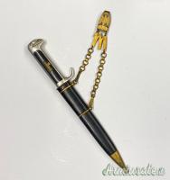 Accessorio epoca fascista coppia di guancette in bachelite di colore nero per pugnale Becco d'aquila