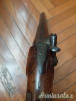 Pistole antiche a cane esterno