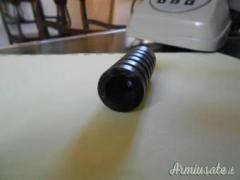 Compensatore freno di bocca spegnifiamma