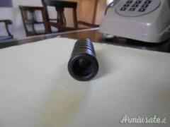 Compensatore freno di bocca spegnifiamma