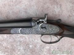 Doppietta Piotti cani esterni armamento automatico cal 12 canne 68.5 incisione Terzi............