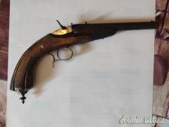 Pistola antica antecedente al 1800