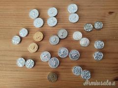 Lotto medaglioni per guancette pistola e revolver