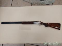 Cal. 28, Sovrapposto Marca Rizzini, Modello Artemis, Canne da Cm. 71 - 4/2, Estrattori Automatici.