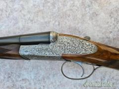 Doppietta Beretta 451 EL cal 12 canne 68 cl/3* incisione firmata Bertella legno grado 5