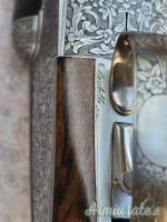 Doppietta Beretta 451 EL cal 12 canne 68 cl/3* incisione firmata Bertella legno grado 5