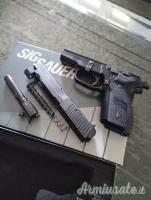 SIG-Sauer 228 9mm Browning Long  |  9x20mm Browning SR