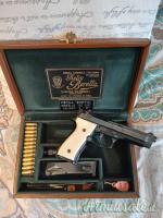 Pistola Beretta Modello DE LUX - NERA - INCISA Pistola Beretta Modello DE LUX - NERA - INCISA