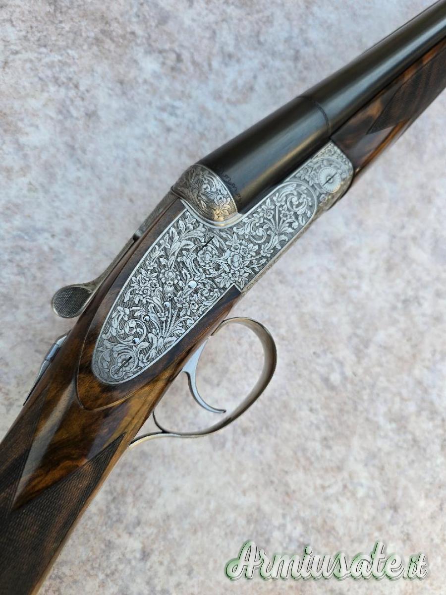 Doppietta Beretta 451 EL cal 12 canne 68 cl/3* incisione firmata Bertella legno grado 5 Doppietta Beretta 451 EL cal 12 canne 68 cl/3* incisione firmata Bertella legno grado 5