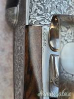Doppietta Beretta 451 EL cal 12 canne 68 cl/3* incisione firmata Bertella legno grado 5 Doppietta Beretta 451 EL cal 12 canne 68 cl/3* incisione firmata Bertella legno grado 5
