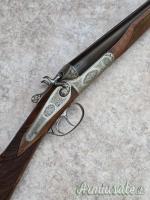 Doppietta cani esterni Boniotti cal 12 canne 70 incisione firmata Guerini proveniente da collezione