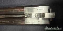 Doppietta Beretta 451 EL cal 12 canne 68 cl/3* incisione firmata Bertella legno grado 5