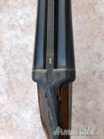 Toschi batterie side lock holland cal 12 con 2 paia di canne da 74 e 71 incisione Fabbrizioli