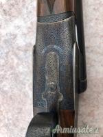 Toschi batterie side lock holland cal 12 con 2 paia di canne da 74 e 71 incisione Fabbrizioli