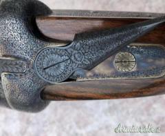 Toschi batterie side lock holland cal 12 con 2 paia di canne da 74 e 71 incisione Fabbrizioli