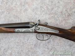 Doppietta cani esterni Boniotti cal 12 canne 70 incisione firmata Guerini proveniente da collezione