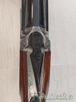 Cal. 28, Sovrapposto Marca Rizzini, Modello Artemis, Canne da Cm. 71 - 4/2, Estrattori Automatici.