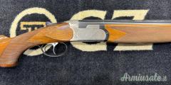 Cal. 20, Sovrapposto Marca Beretta, Mod. S57E, Canne da Cm. 71 3/1, Estrattori Automatici.
