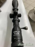 Tikka T3 light 6.5x55mm Meopta 2100 Artemis 7x50 ill.