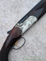 Sovrapposto Redolfi cal 20 canne 71 incisione Sabatti condizioni pari al nuovo