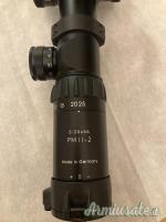 Schmidt & Bender 5–25×56 PM II/2 P4L DT 1/4 MOA