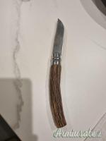 Coltello pieghevole con palco di cervo