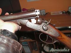 FUCILI CAL.12  ANTICHI A CANI ESTERNI -