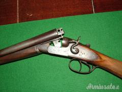 FUCILI CAL.12  ANTICHI A CANI ESTERNI -