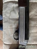 Benelli 121 12 inciso con legni in radica d’ulivo.