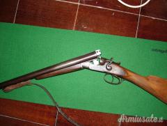 FUCILI CAL. 12 ANTICHI A CANI ESTERNI.