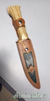 Coltello da caccia artigianale nuovo.