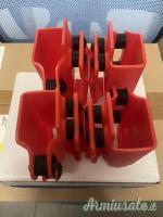 Porta caricatori con viti regolabili