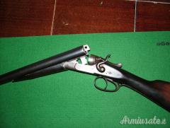 FUCILI CAL. 12 ANTICHI A CANI ESTERNI