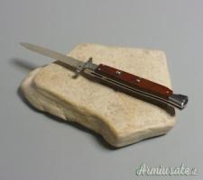 Coltello a scatto Cm.28 Mod.Swinguard Sblct/28 Legno palissandro chiaro con lavorazione file work