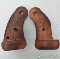 Coppia guancette Colt Cobra di cui una rotta.