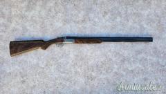 Sovrapposto Famars Excalibur round body cal 20 canne 71 chiusura tipo Boss completo di valigetta