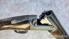 Sovrapposto Famars Excalibur round body cal 20 canne 71 chiusura tipo Boss completo di valigetta