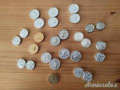 Lotto medaglioni per guancette pistola e revolver