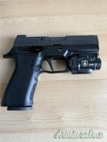 SIG-Sauer P320 9x21mm IMI