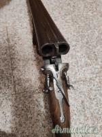 Doppietta clalibro 16 con cani esterni