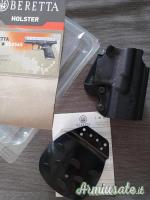 # Vendo/Scambio Fondina Apx e portacaricatori