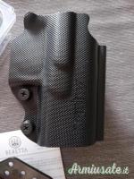 # Vendo/Scambio Fondina Apx e portacaricatori