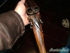 FUCILI CAL. 12 ANTICHI A CANI ESTERNI